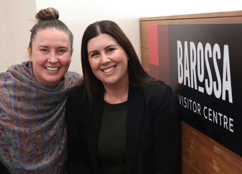 Megan and Amy beside the Barossa Visitor Centre sign