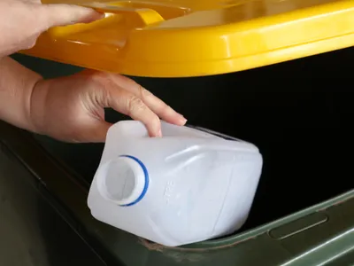 Plastic milk container goes into yellow bin