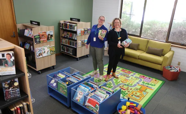 Two library services officers in the revamped Mount Pleaseant Library space