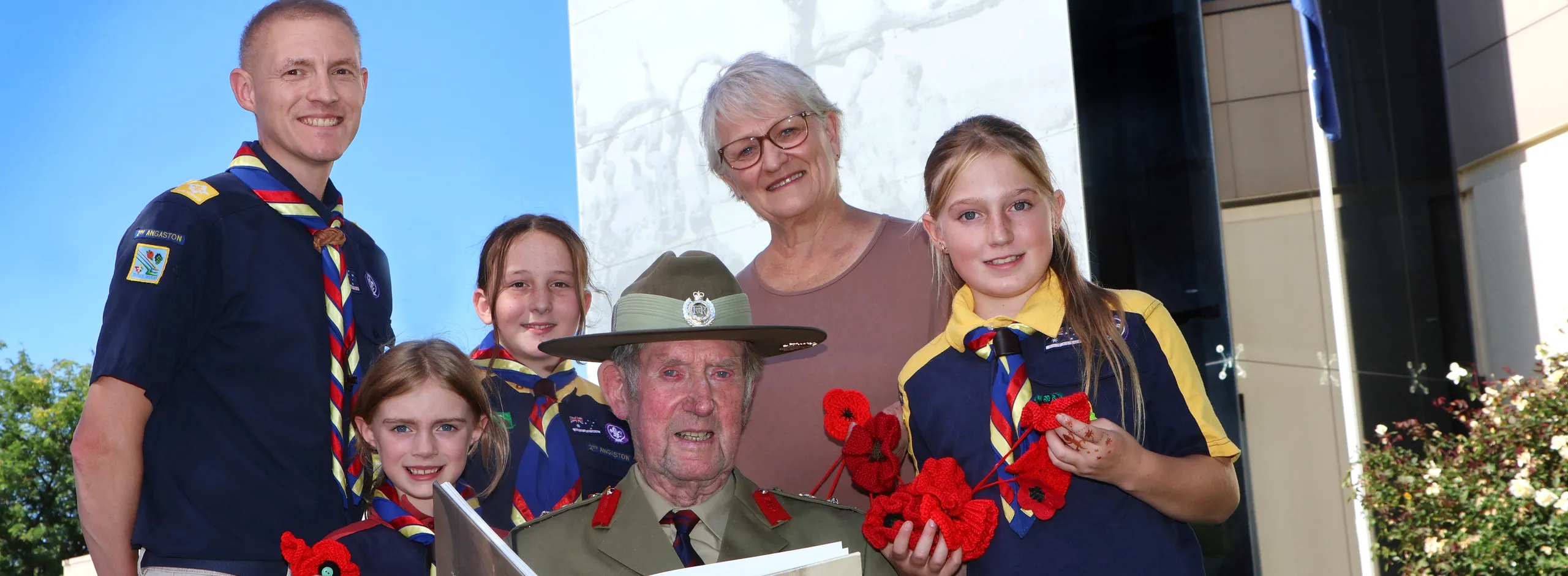 Scouts with a veteran and historian in front of Nuriootpa Council office
