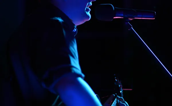 Chayse Larsen playing guitar
