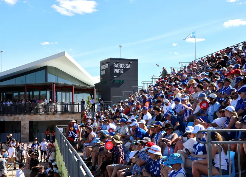 Crowd of AFL fans in stand at Barossa Park, Lyndoch