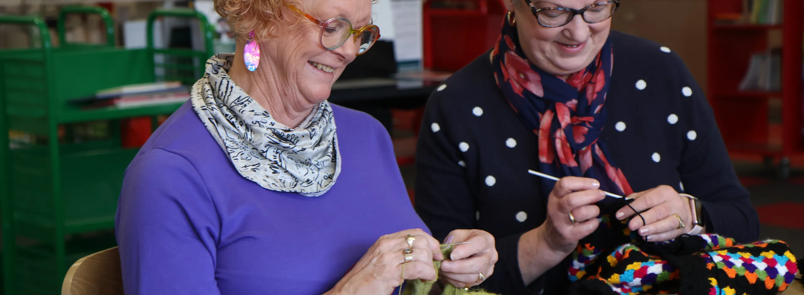 Two women working on crochet