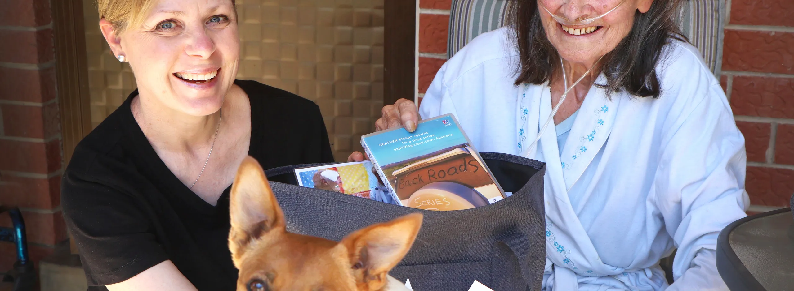 Library home delivery service with Honey the doggo