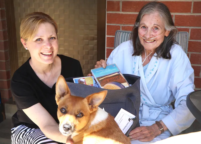 Library home delivery service with Honey the doggo