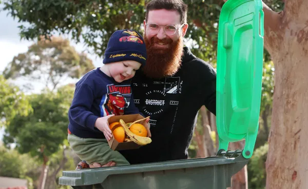 Teddy and Tom with bin