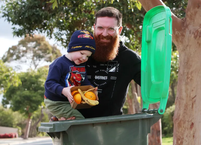 Teddy and Tom with bin