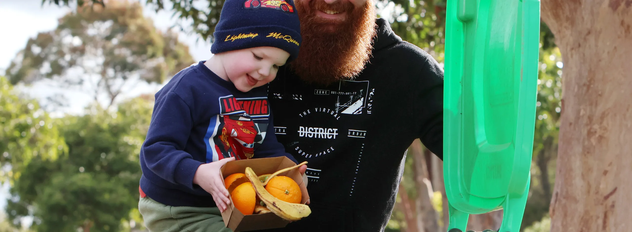 Teddy and Tom with bin